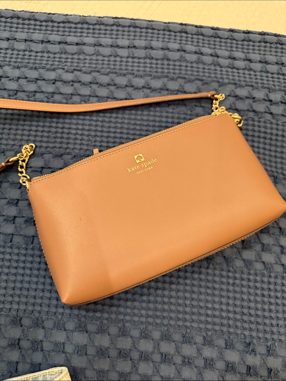 kate spade taupe leather crossbody with gold-tone logo